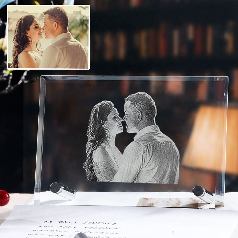 Glass engraving of a couple with an inset photo of the same couple.