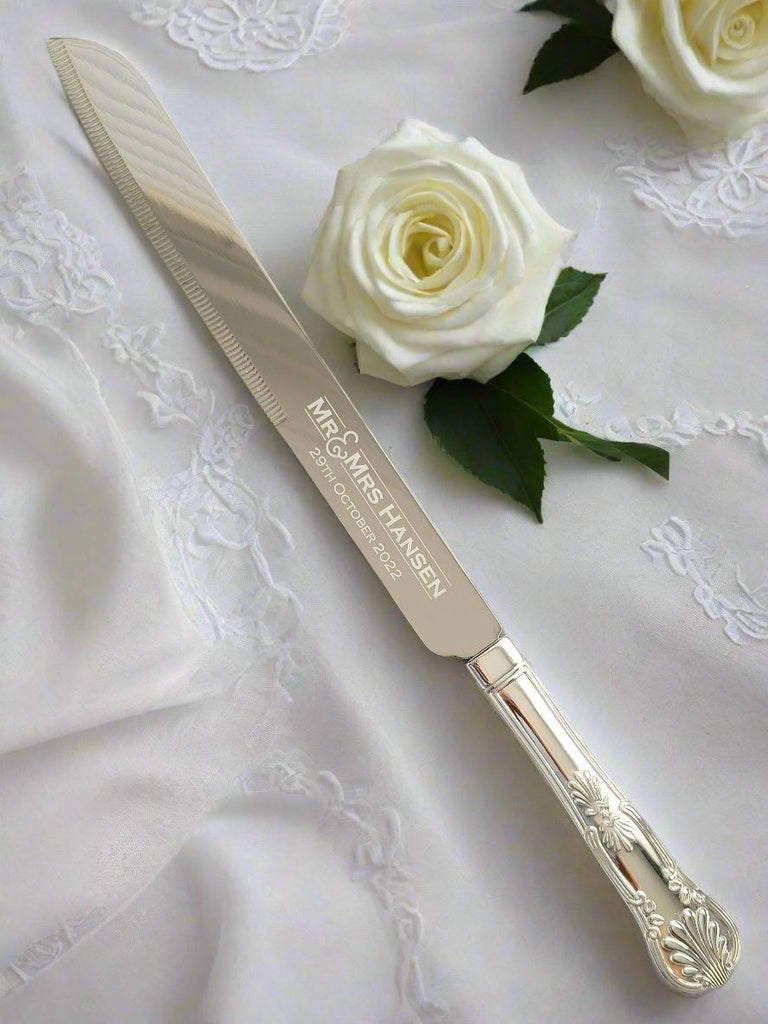 Personalized cake knife in presentation box, engraved with names, date, or message, perfect wedding gift.