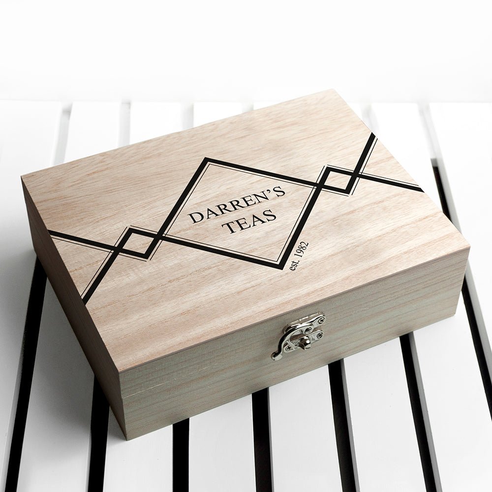 Personalized wooden tea box for men, filled with a selection of Pukka teas, custom name and year.