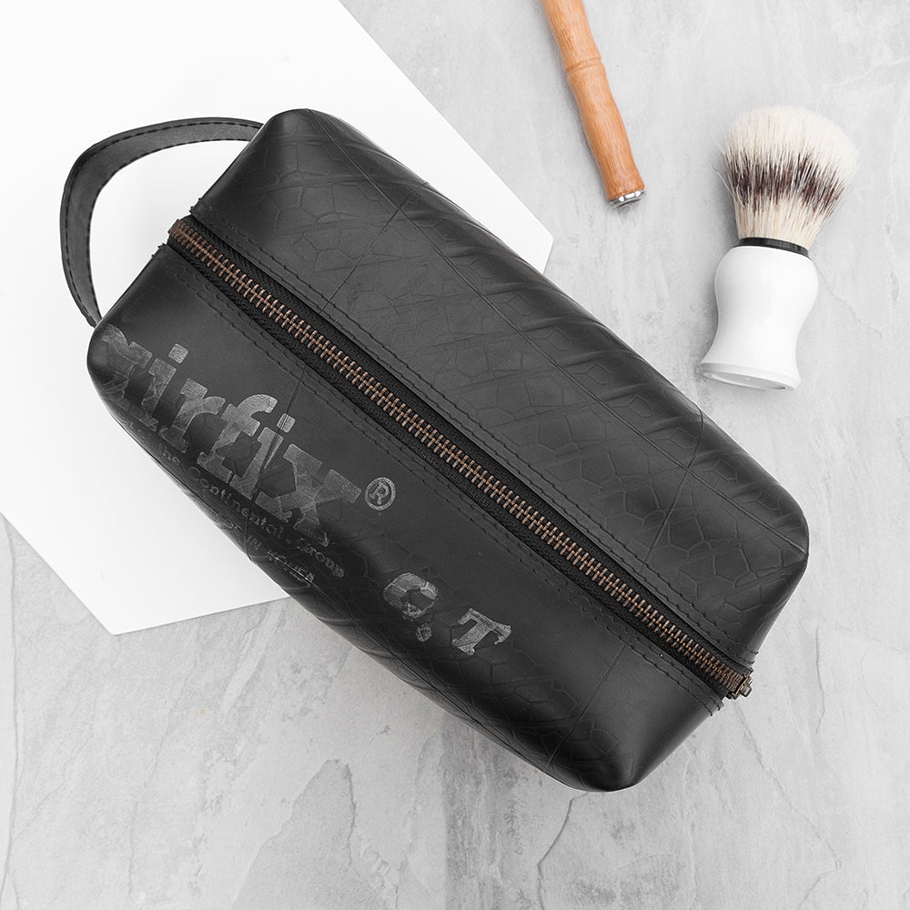 Upcycled truck tyre rubber men's wash bag, eco-friendly, waterproof, durable, unique design, 22cm x 10cm x 12cm.