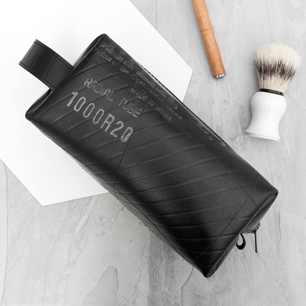 Upcycled truck tyre rubber men's wash bag, eco-friendly, waterproof, durable, unique design, 22cm x 10cm x 12cm.