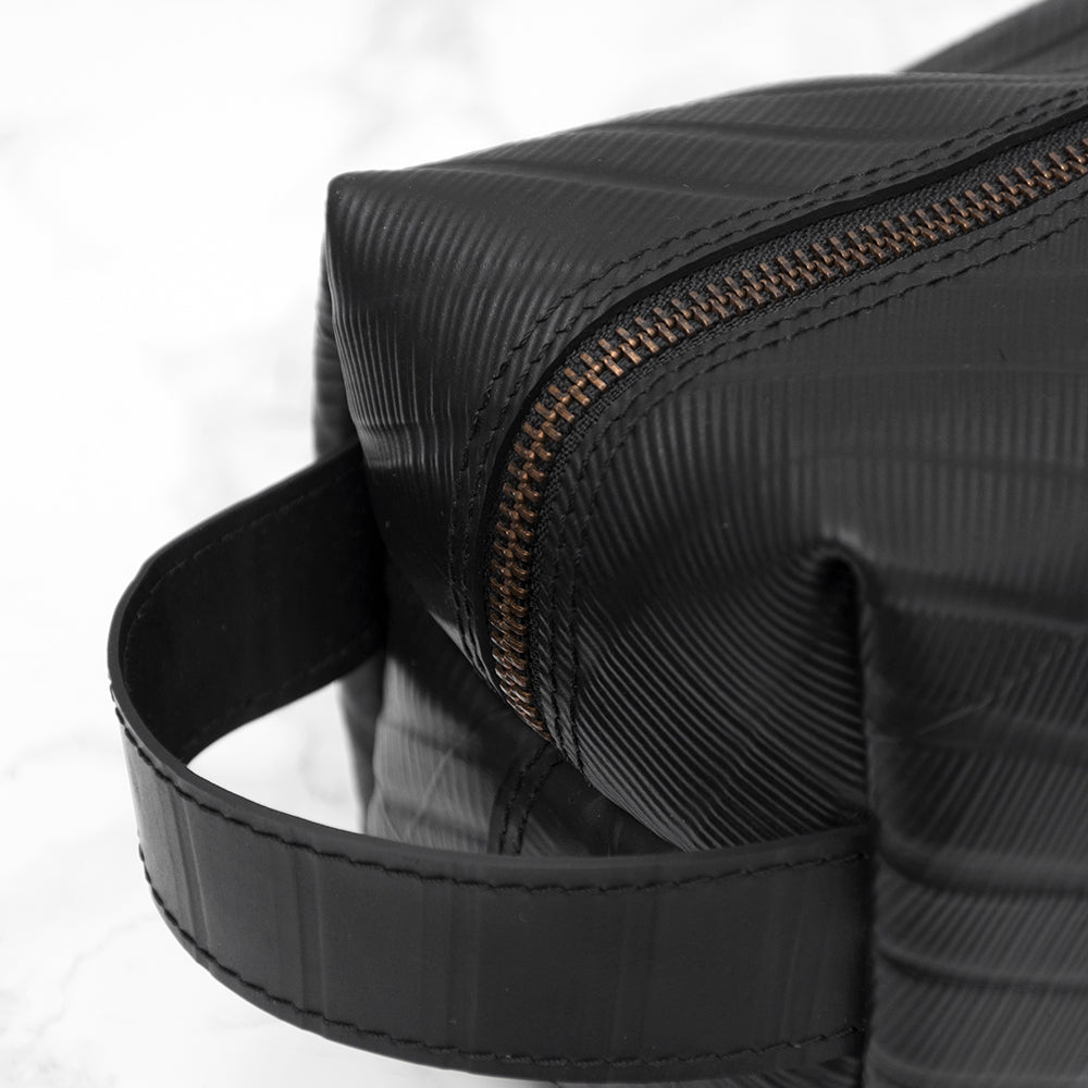 Upcycled truck tyre rubber men's wash bag, eco-friendly, waterproof, durable, unique design, 22cm x 10cm x 12cm.