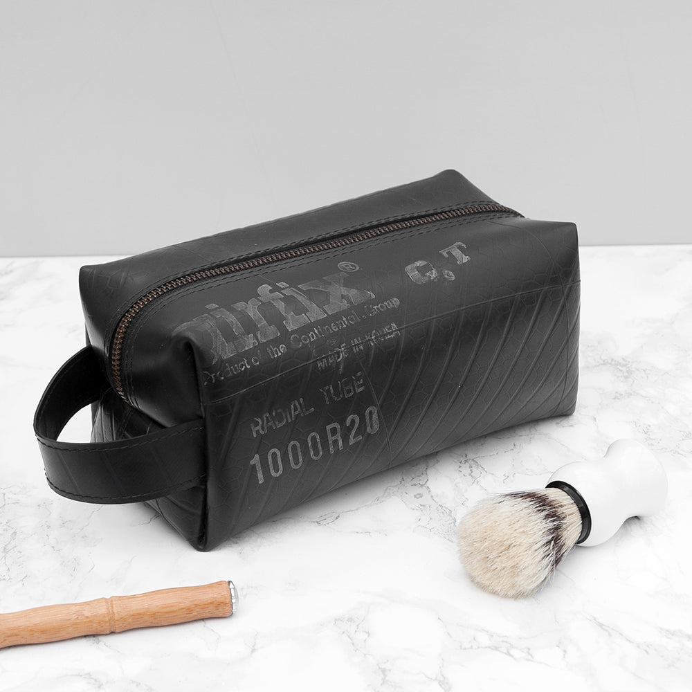 Upcycled truck tyre rubber men's wash bag, eco-friendly, waterproof, durable, unique design, 22cm x 10cm x 12cm.