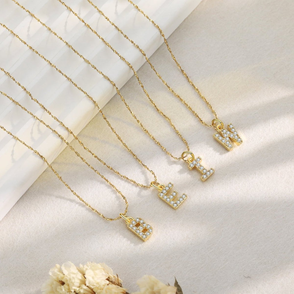 18ct gold-plated stainless steel necklace with initial letter and CZ stones, 40+5cm chain.