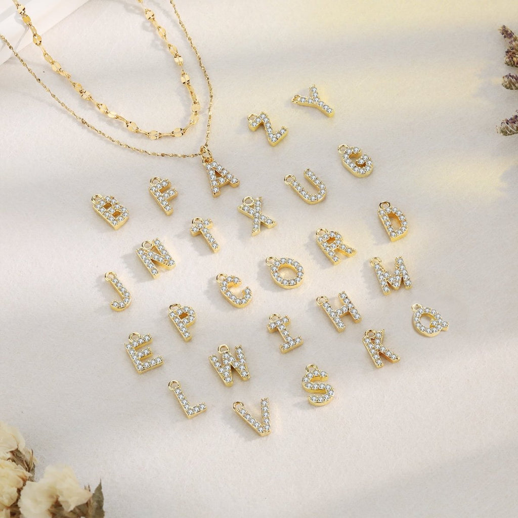 18ct gold-plated stainless steel necklace with initial letter and CZ stones, 40+5cm chain.