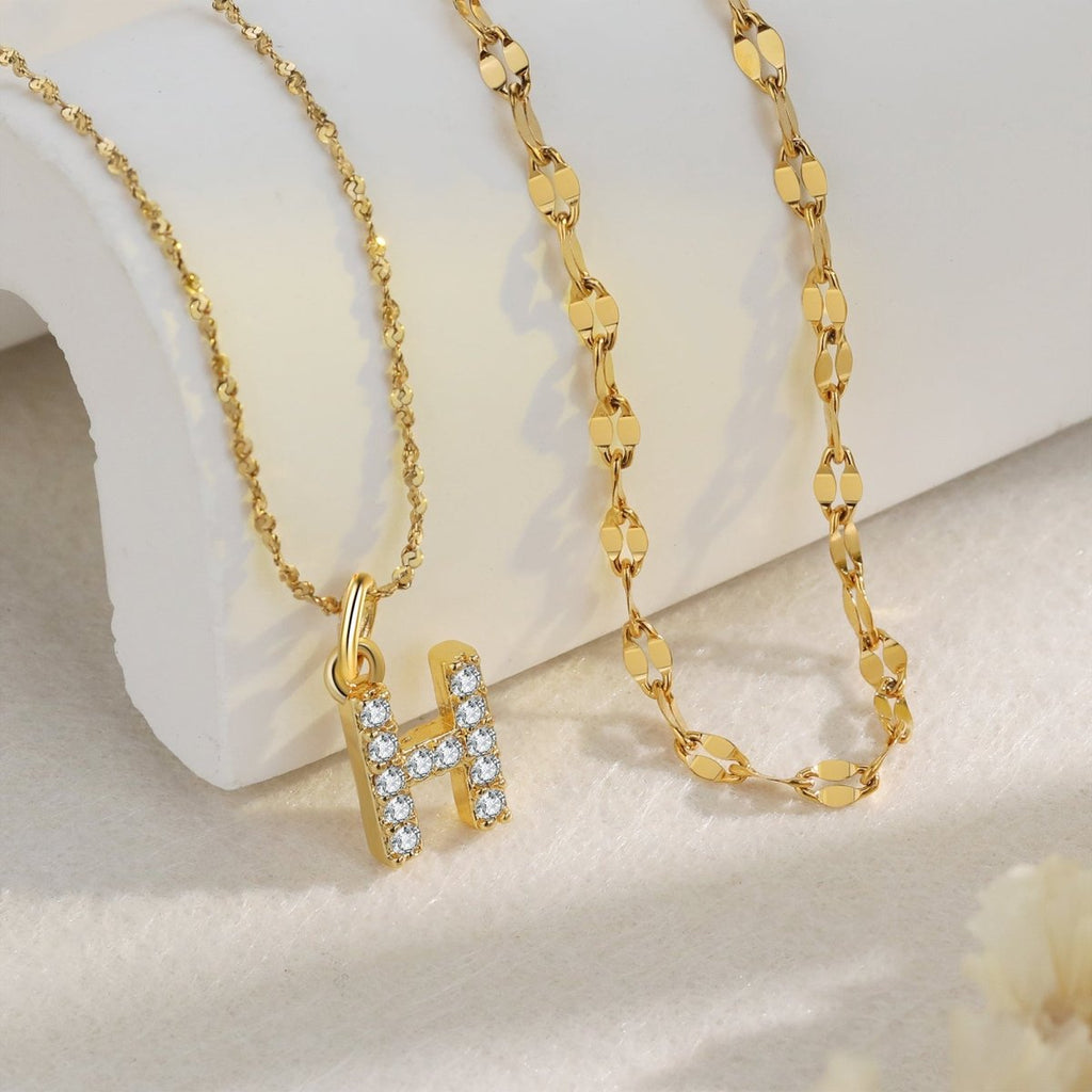 18ct gold-plated stainless steel necklace with initial letter and CZ stones, 40+5cm chain.