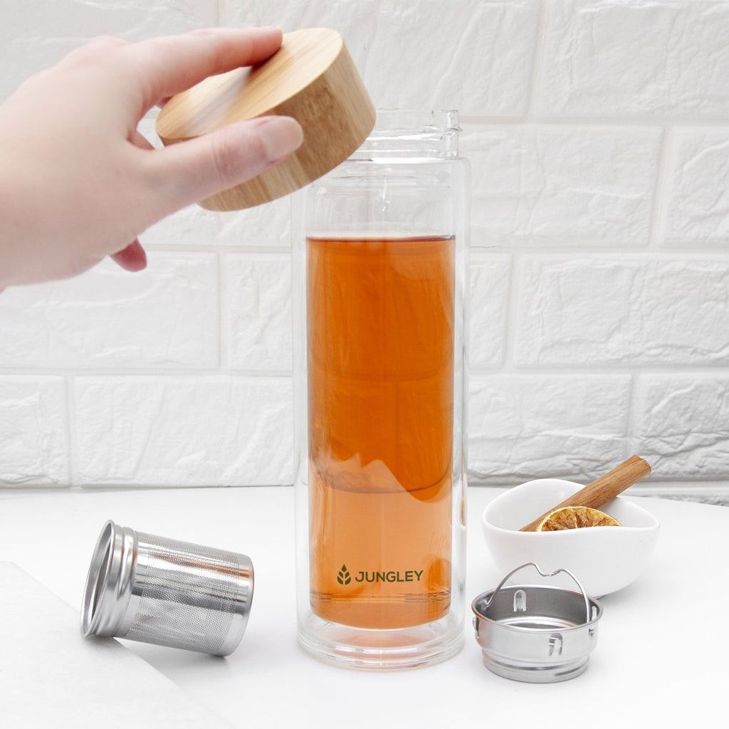 Eco-friendly glass tea tumbler with bamboo lid, stainless steel infuser, 23cm x 7.4cm, BPA-free.
