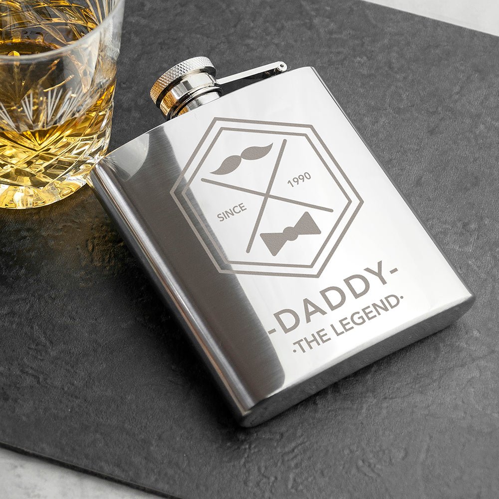 Personalized silver hip flask with engraved name and year, moustache design, stainless steel.
