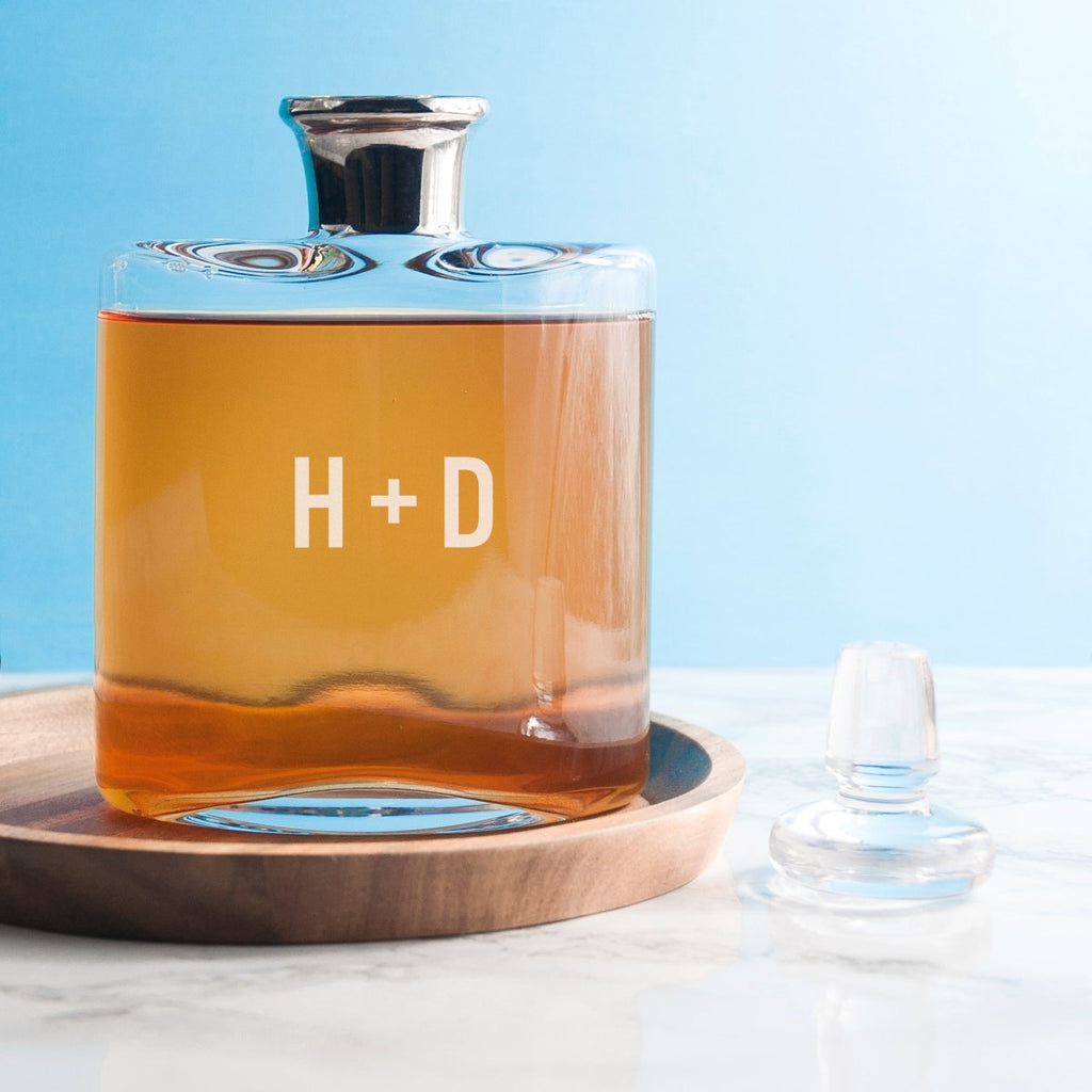 Elegant LSA decanter with a platinum neck, mouth-blown glass, and monogram engraving. Holds 0.35L whiskey.