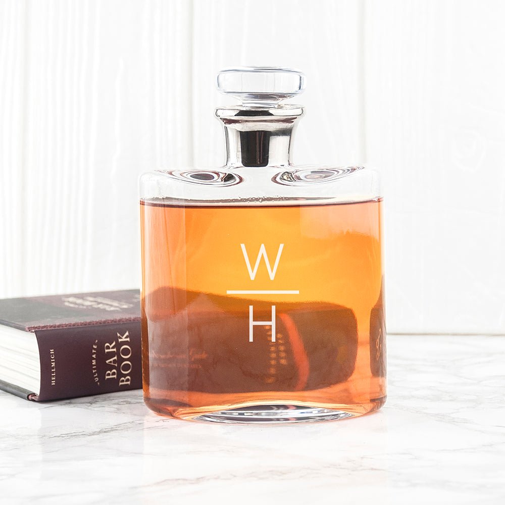 Elegant LSA decanter with a platinum neck, mouth-blown glass, and monogram engraving. Holds 0.35L whiskey.
