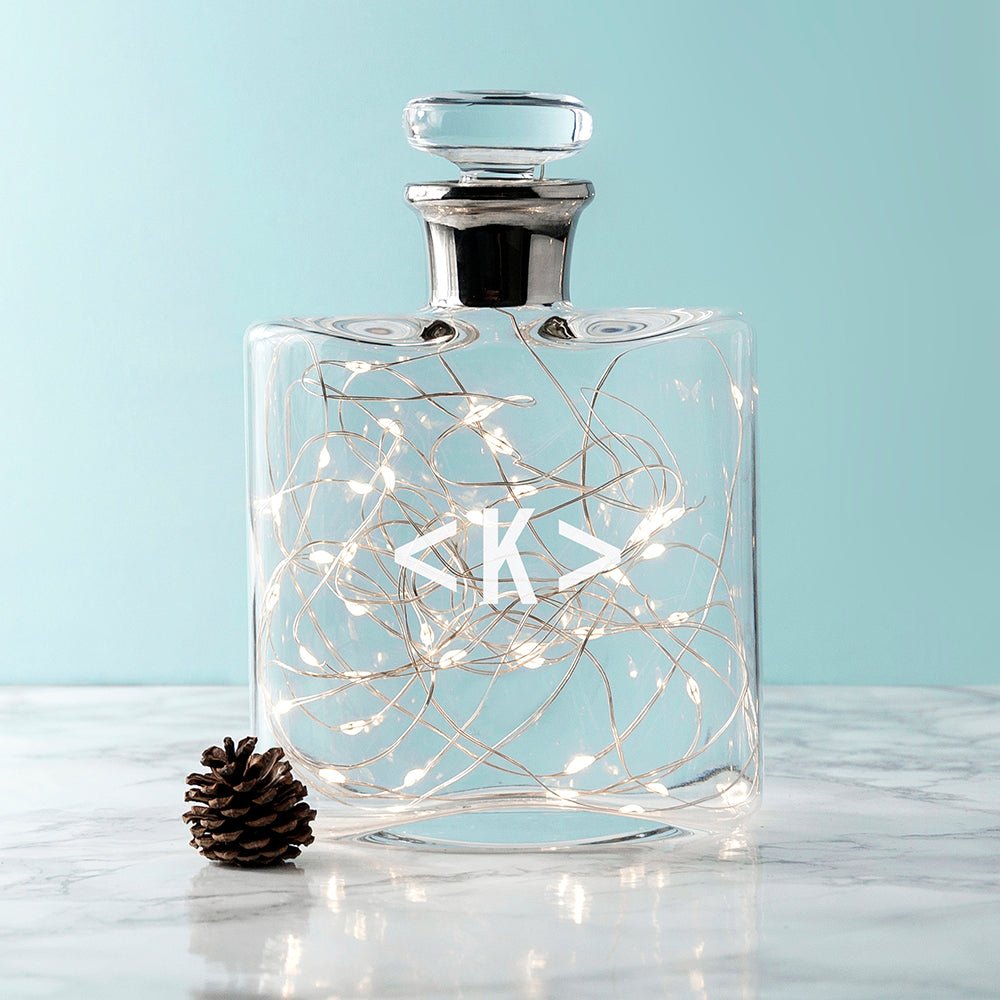 Elegant LSA decanter with a platinum neck, mouth-blown glass, and monogram engraving. Holds 0.35L whiskey.