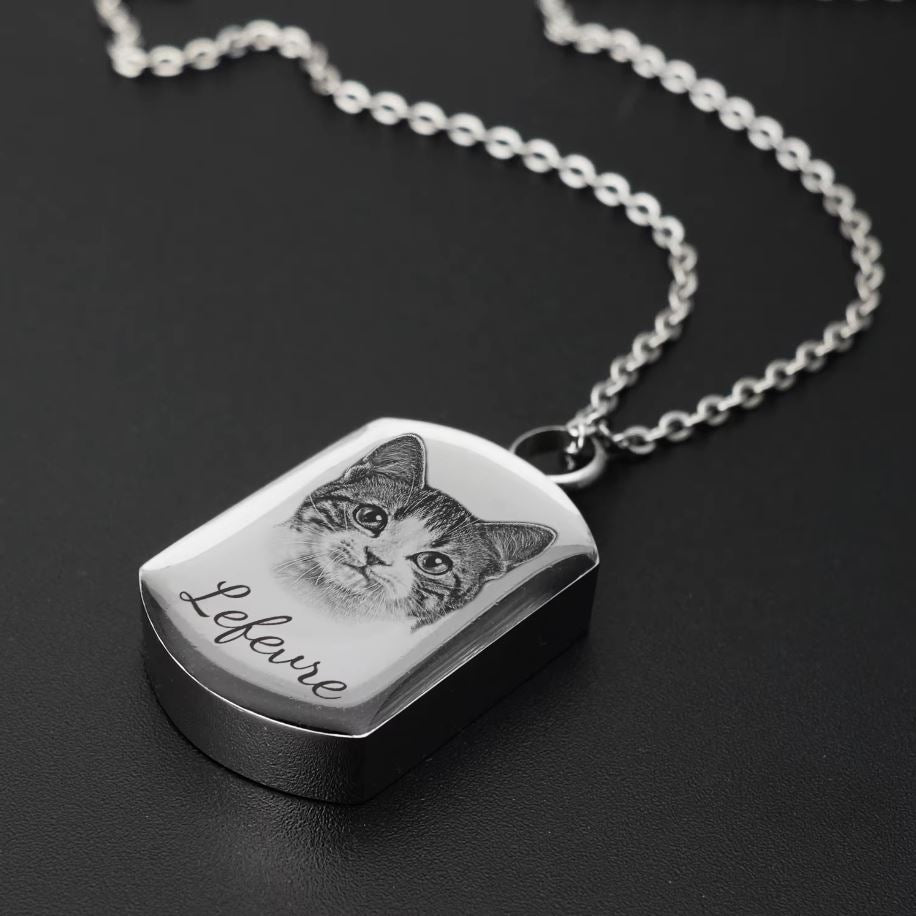 Keep your pet’s memory close with this personalised urn necklace, holding ashes and a cherished photo.