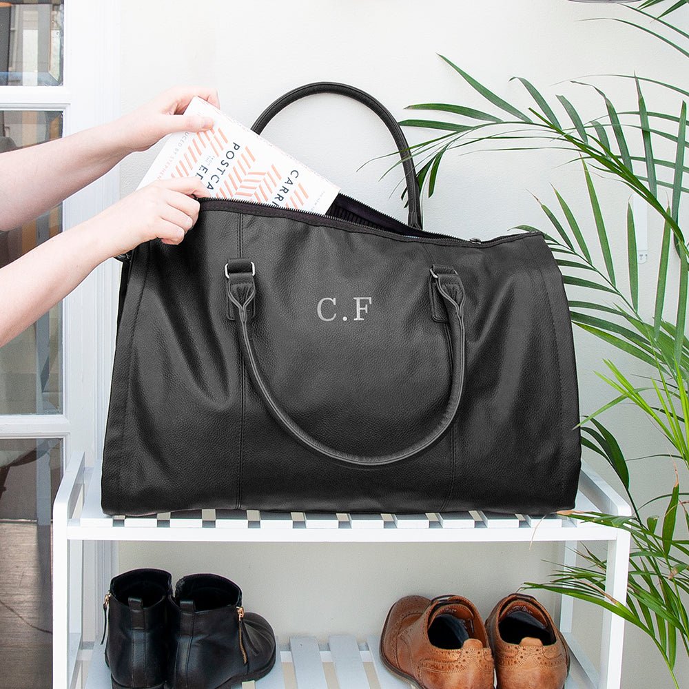 Monogrammed vegan leather travel suit bag, 37L, black or brown, personalized with up to 3 initials.