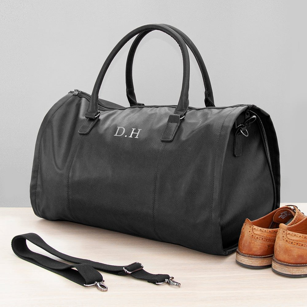 Monogrammed vegan leather travel suit bag, 37L, black or brown, personalized with up to 3 initials.