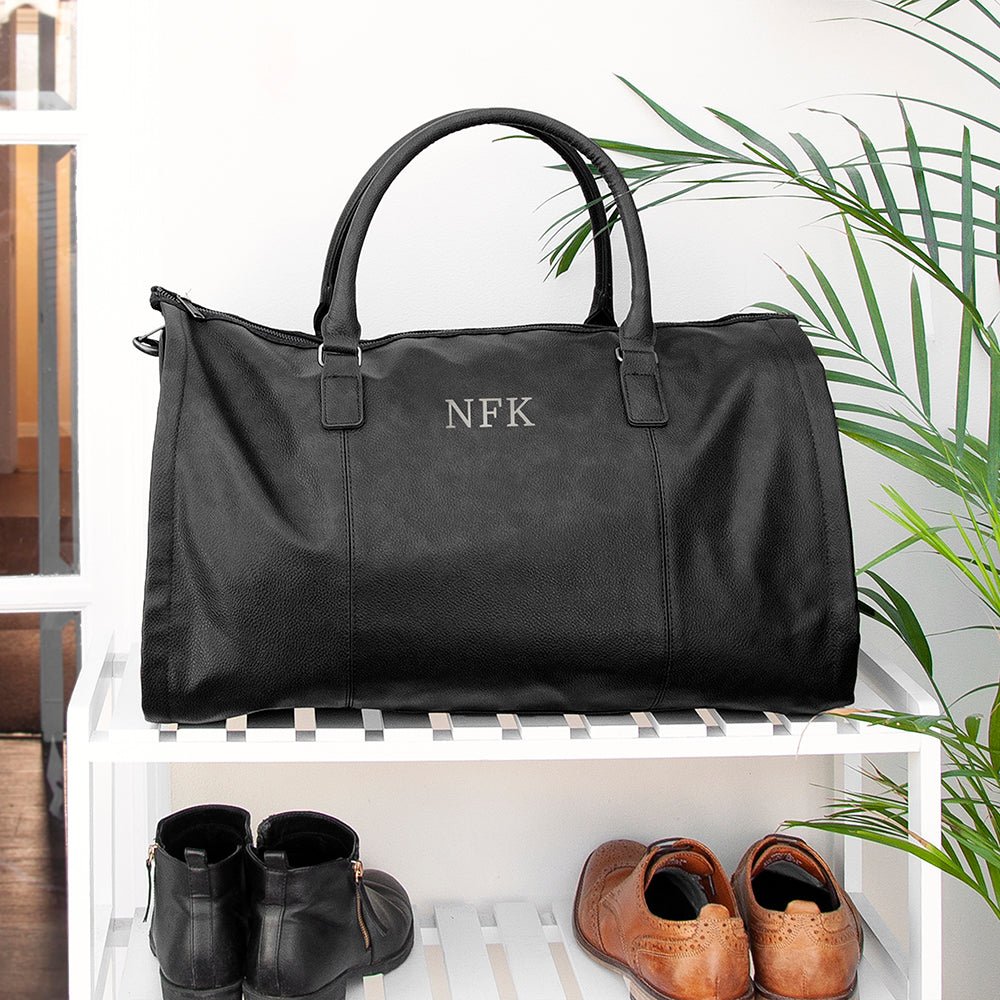 Monogrammed vegan leather travel suit bag, 37L, black or brown, personalized with up to 3 initials.