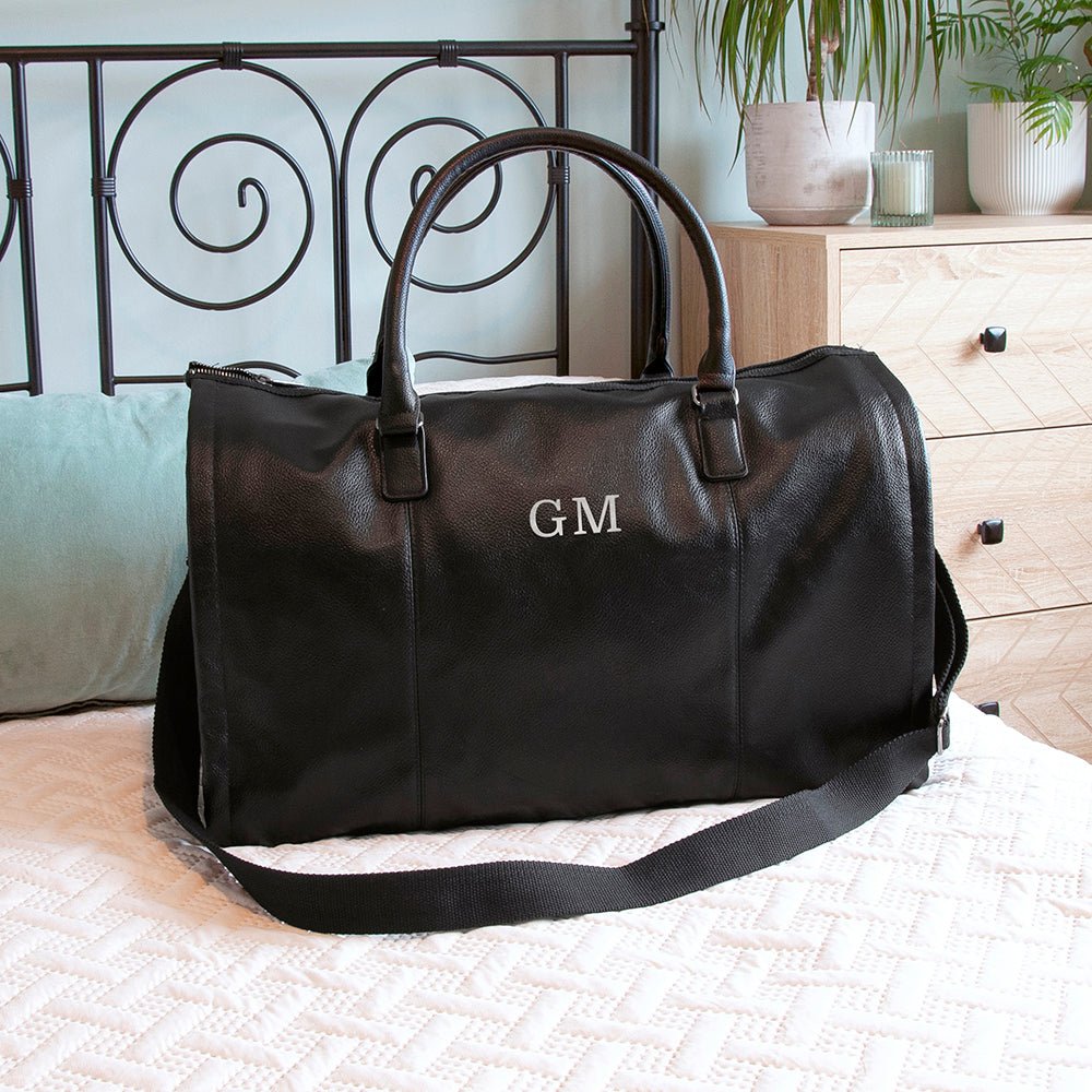 Monogrammed vegan leather travel suit bag, 37L, black or brown, personalized with up to 3 initials.