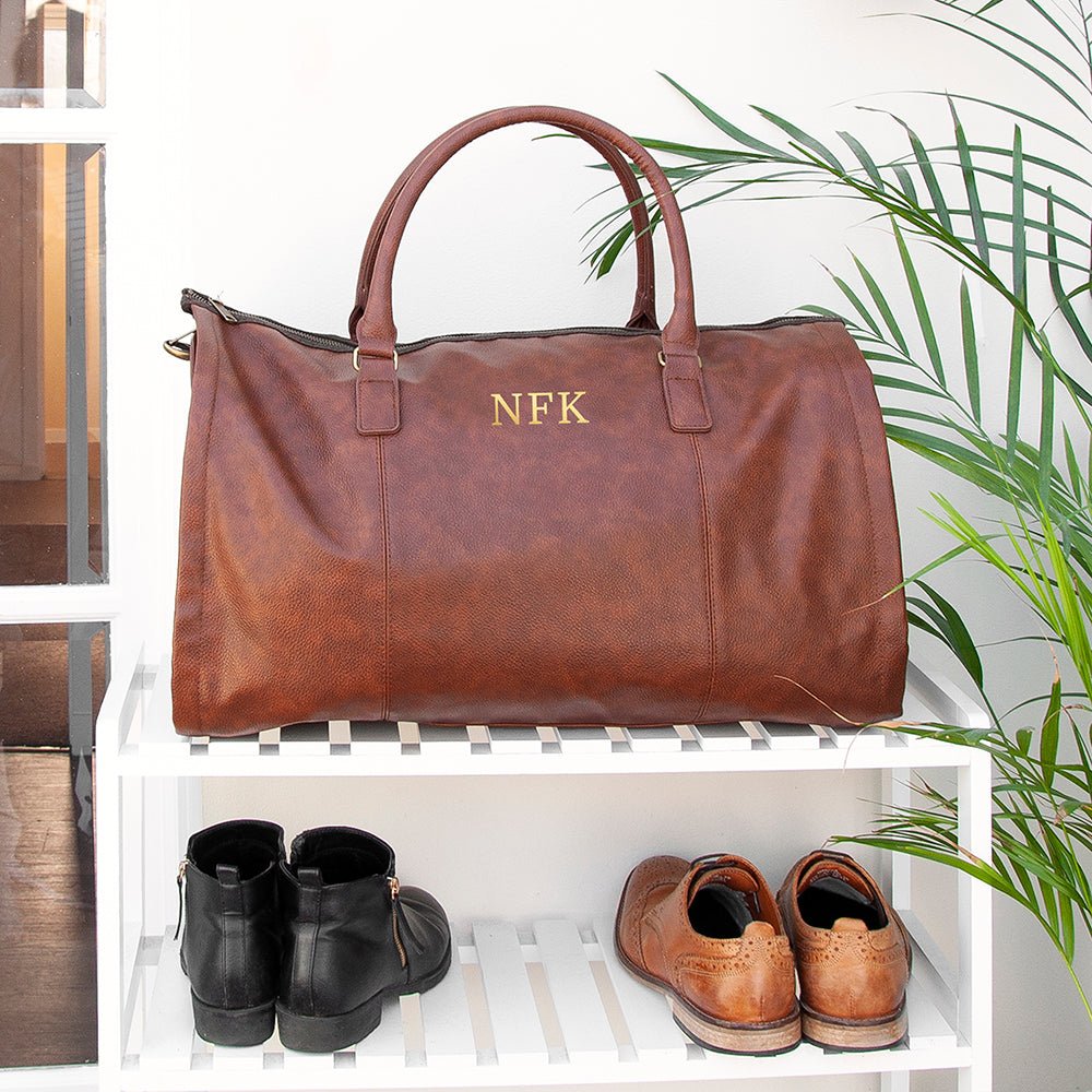 Monogrammed vegan leather travel suit bag, 37L, black or brown, personalized with up to 3 initials.