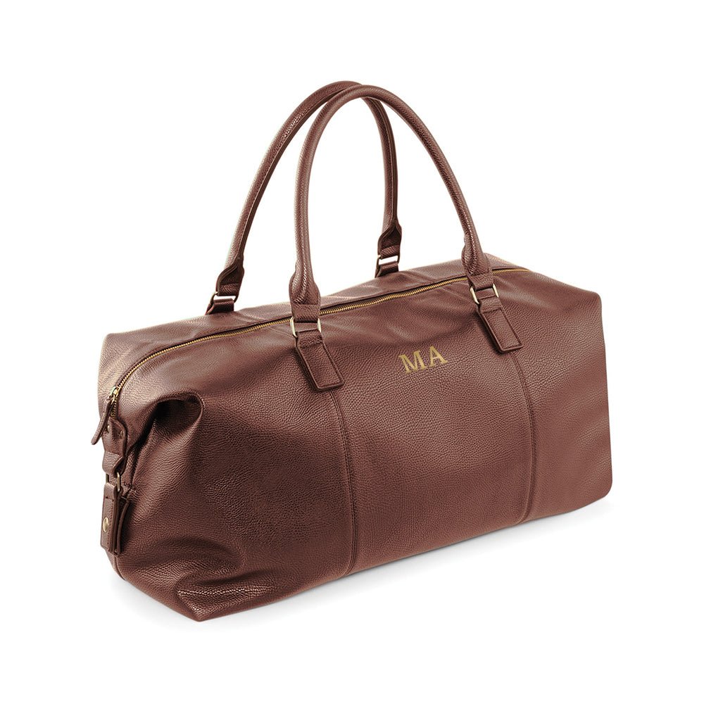 Monogrammed vegan leather weekender holdall, 30L, black or brown, personalized with up to 3 initials.
