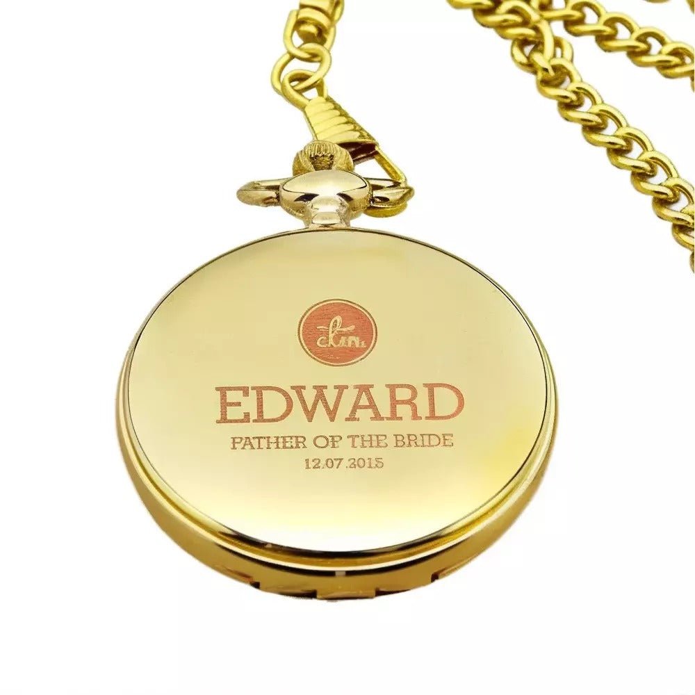 A gold pocket watch engraved with the name "EDWARD" and the date "12.07.2015" on its face.