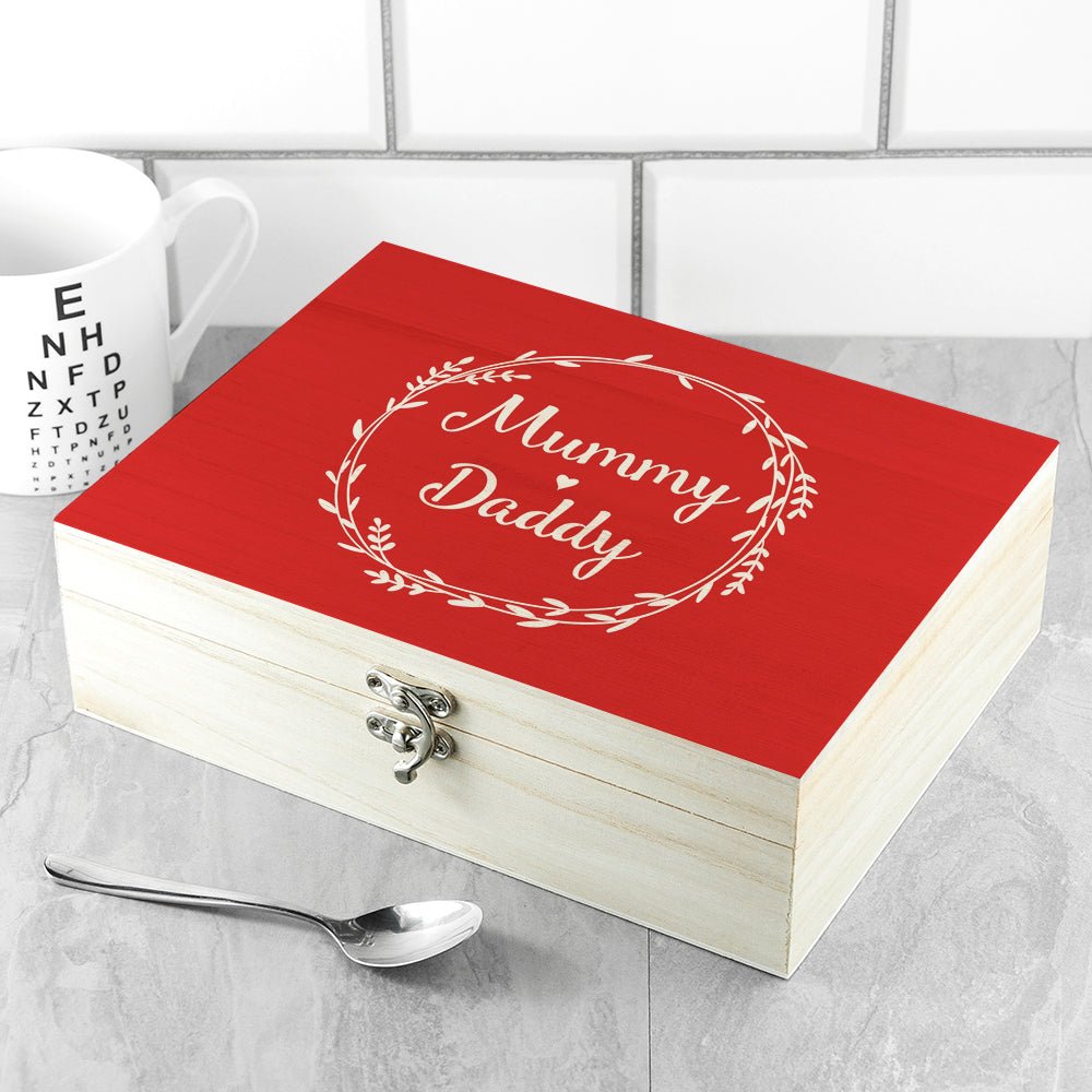 Floral wreath design engraved on wooden tea box