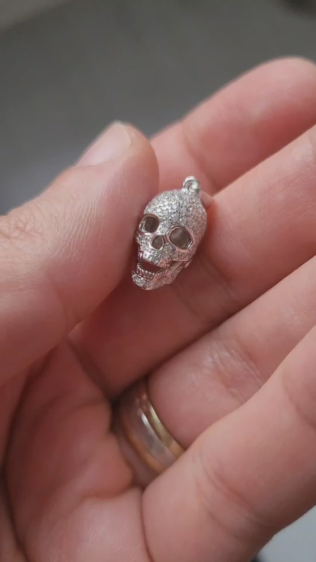 Sterling silver skull pendant necklace with CZ stones, Comes with a 20-inch chain and gift box.