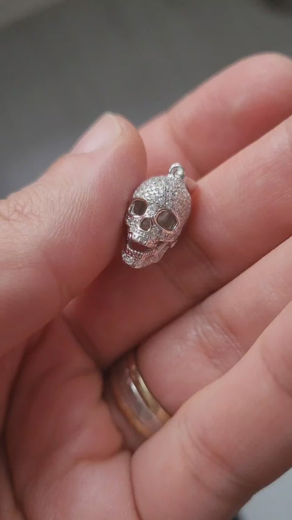 Sterling silver skull pendant necklace with CZ stones, Comes with a 20-inch chain and gift box.