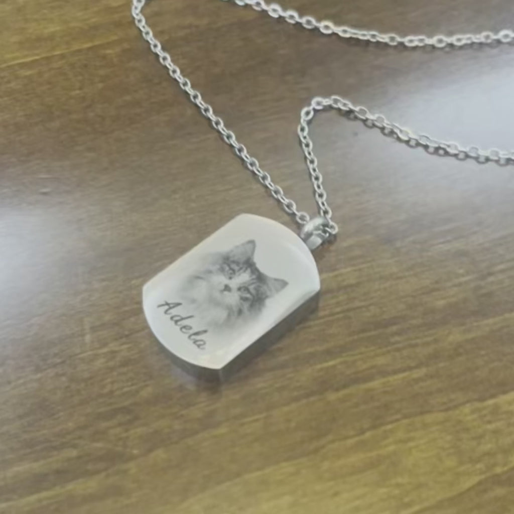 Keep your pet’s memory close with this personalised urn necklace, holding ashes and a cherished photo.