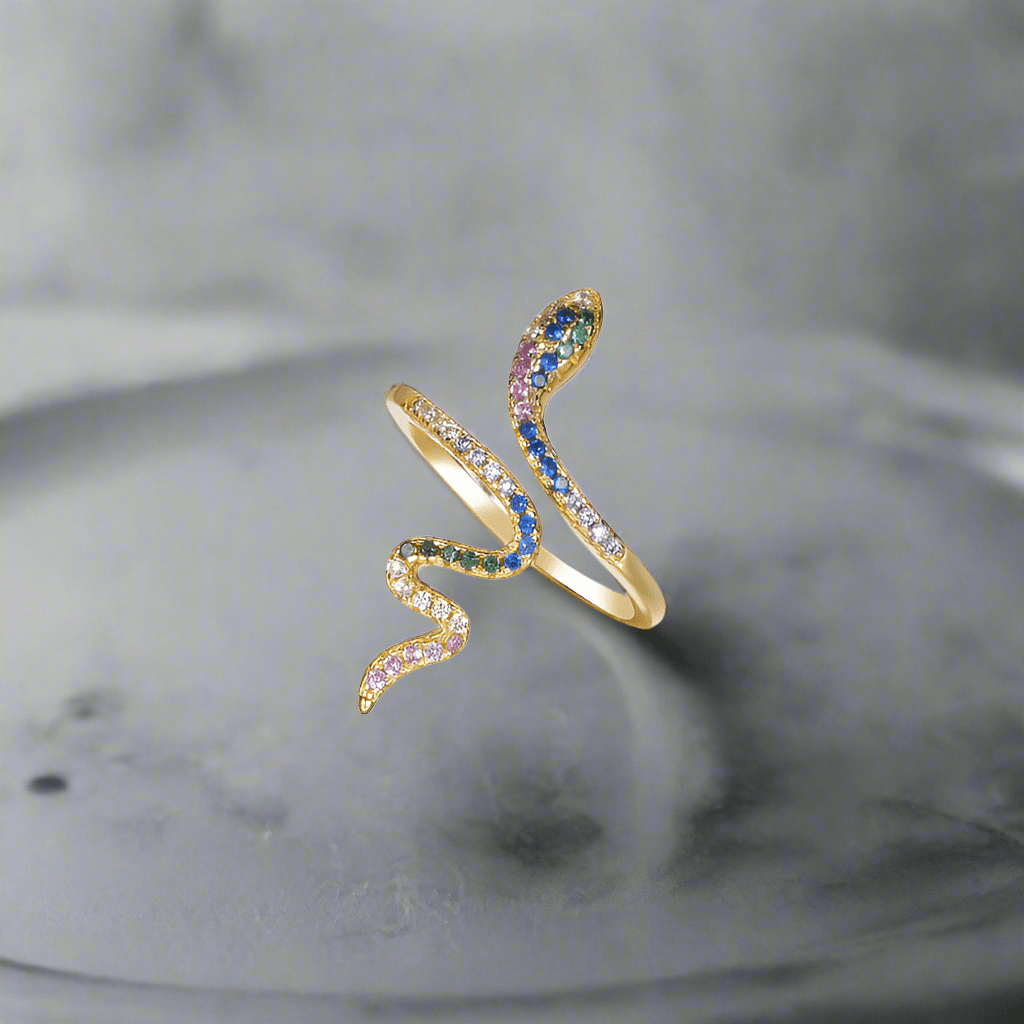 Gold-plated sterling silver snake ring with sparkling CZ stones—a striking symbol of power and allure.