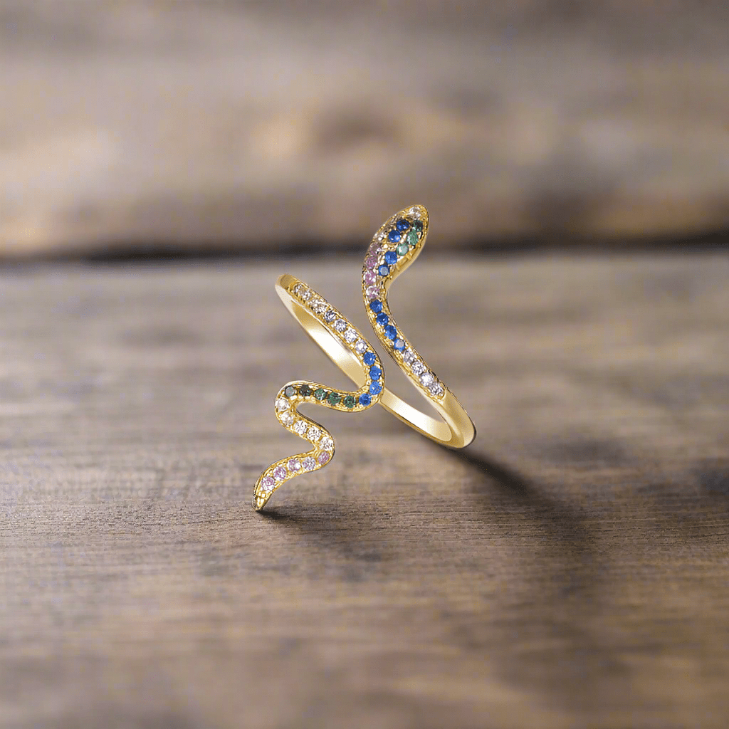 Gold-plated sterling silver snake ring with sparkling CZ stones—a striking symbol of power and allure.
