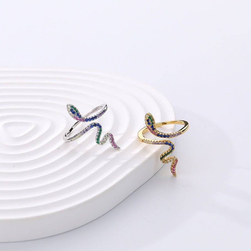 Gold-plated sterling silver snake ring with sparkling CZ stones—a striking symbol of power and allure.