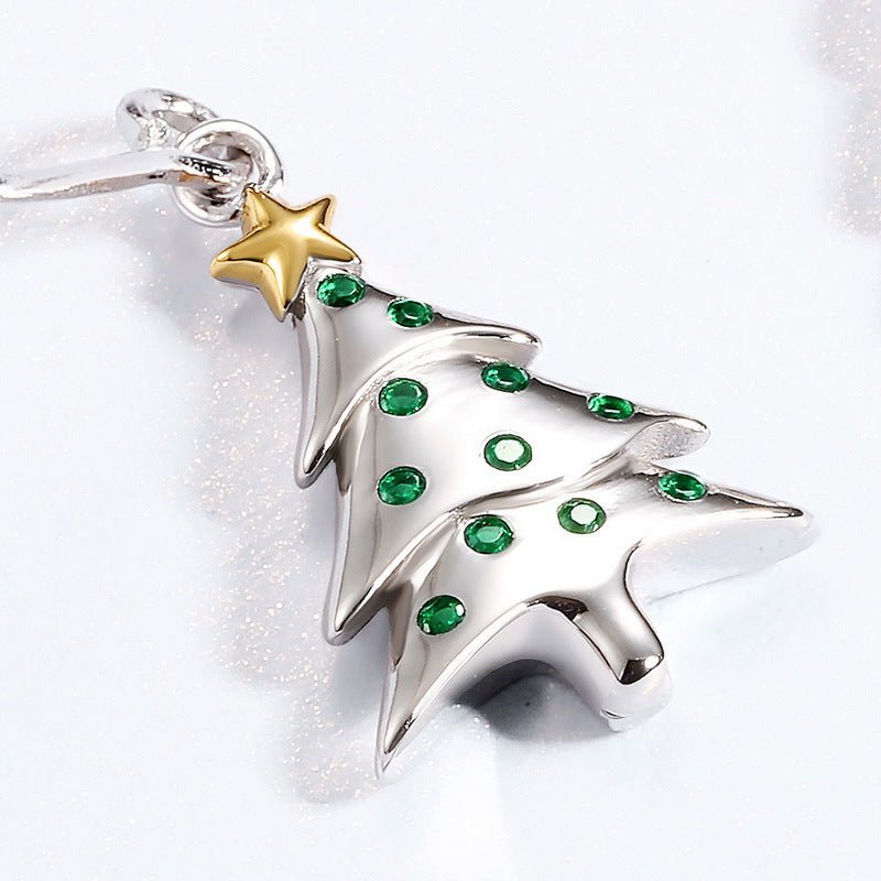 Festive sterling silver Christmas tree earrings—perfect for adding holiday sparkle to any outfit this season.