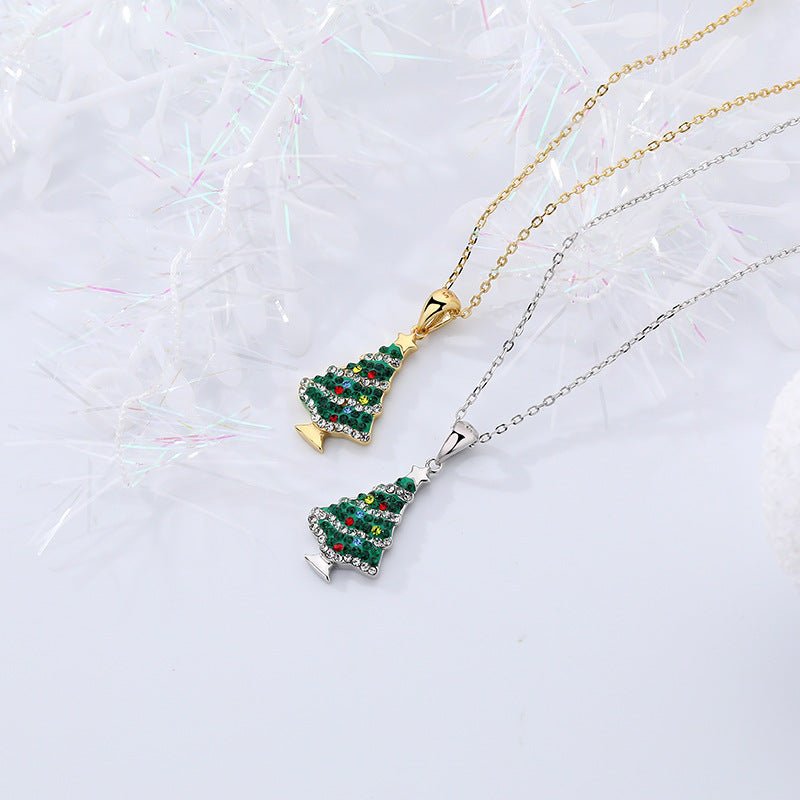 Festive sterling silver Christmas tree necklace with sparkling CZ stones—perfect for adding holiday charm.