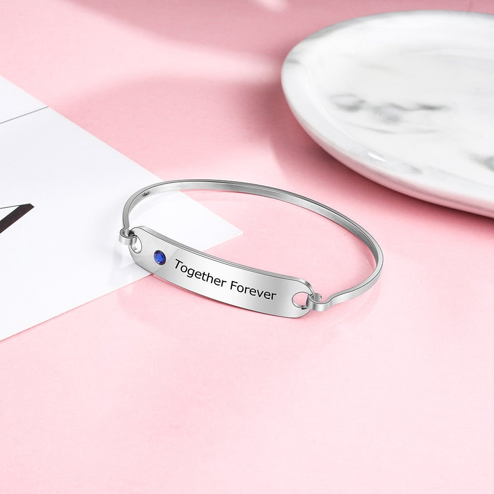 Personalized white gold plated birthstone bangle bracelet, engraved stainless steel, 17cm, 8.1g, perfect for gifting.