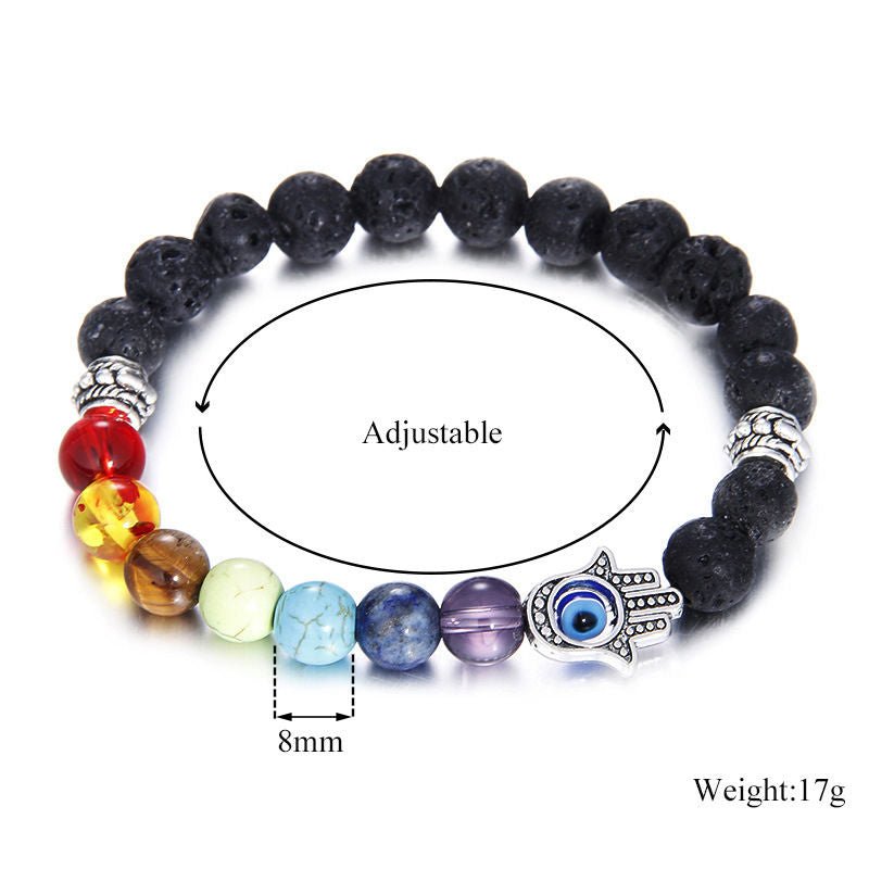 Chakra bead lava stone bracelet with evil eye charm, adjustable, spiritual protection, energy balancing.