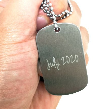 Customizable stainless steel dog tag necklace, perfect Father's Day gift featuring family photos or text. Double-sided design.