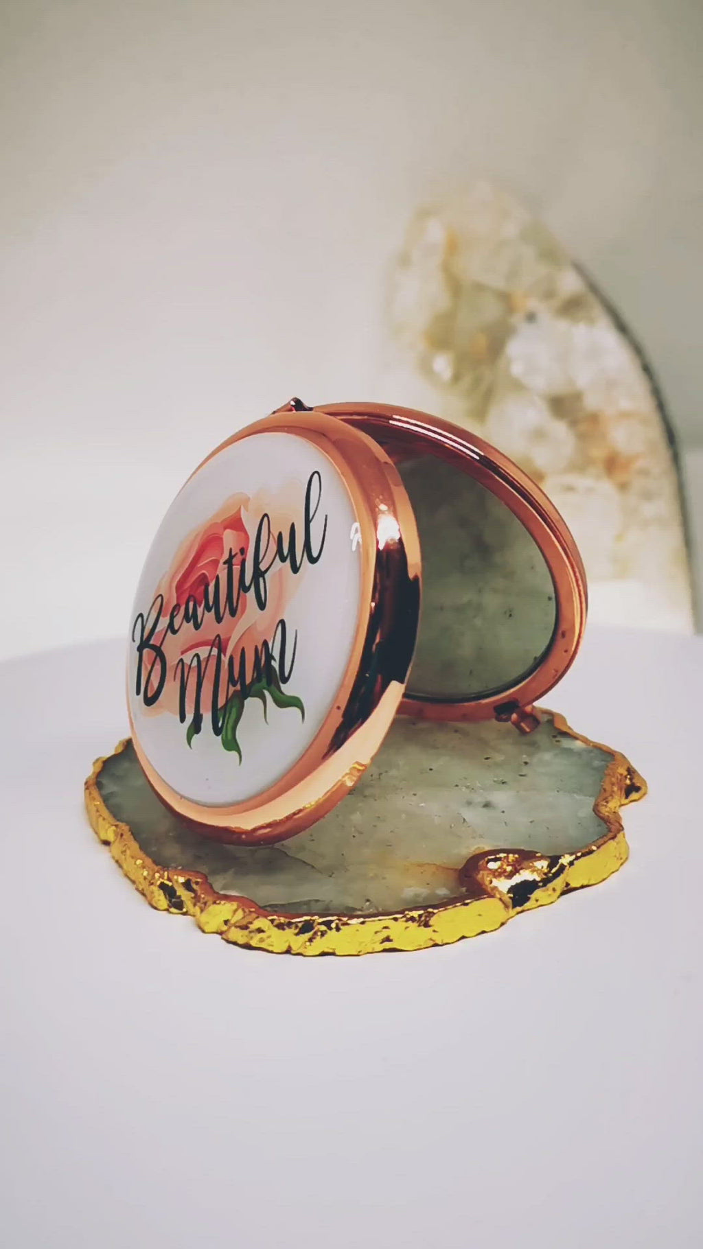 Personalized Rose Gold Handbag Mirror with engraving up to 150 characters. Features 70mm diameter, two mirrors (normal and magnifying), and button release. 