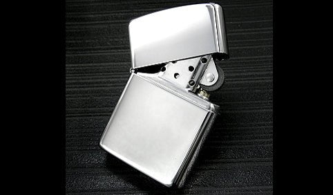 Personalized Zippo lighter, engraved with custom photo & text, ideal Father's Day gift or keepsake.