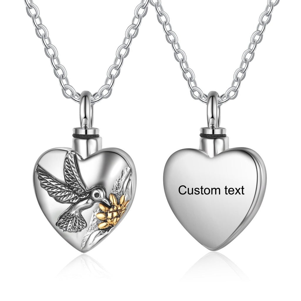 Stainless steel heart cremation necklace with hummingbird design, 45cm chain, holds ashes, 17.7g.