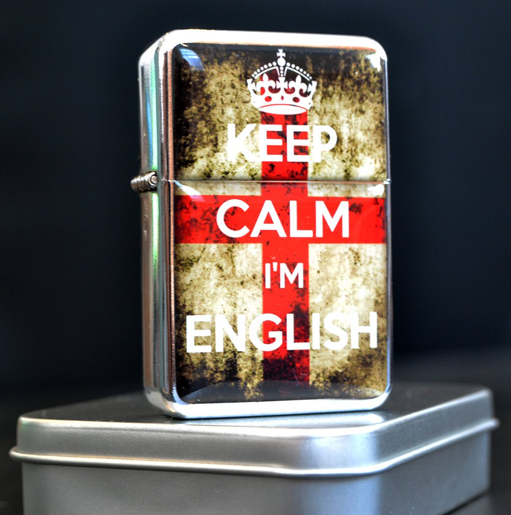 Engraved 'Keep Calm I'm English' star petrol lighter with flint ignition, comes in a tin box.