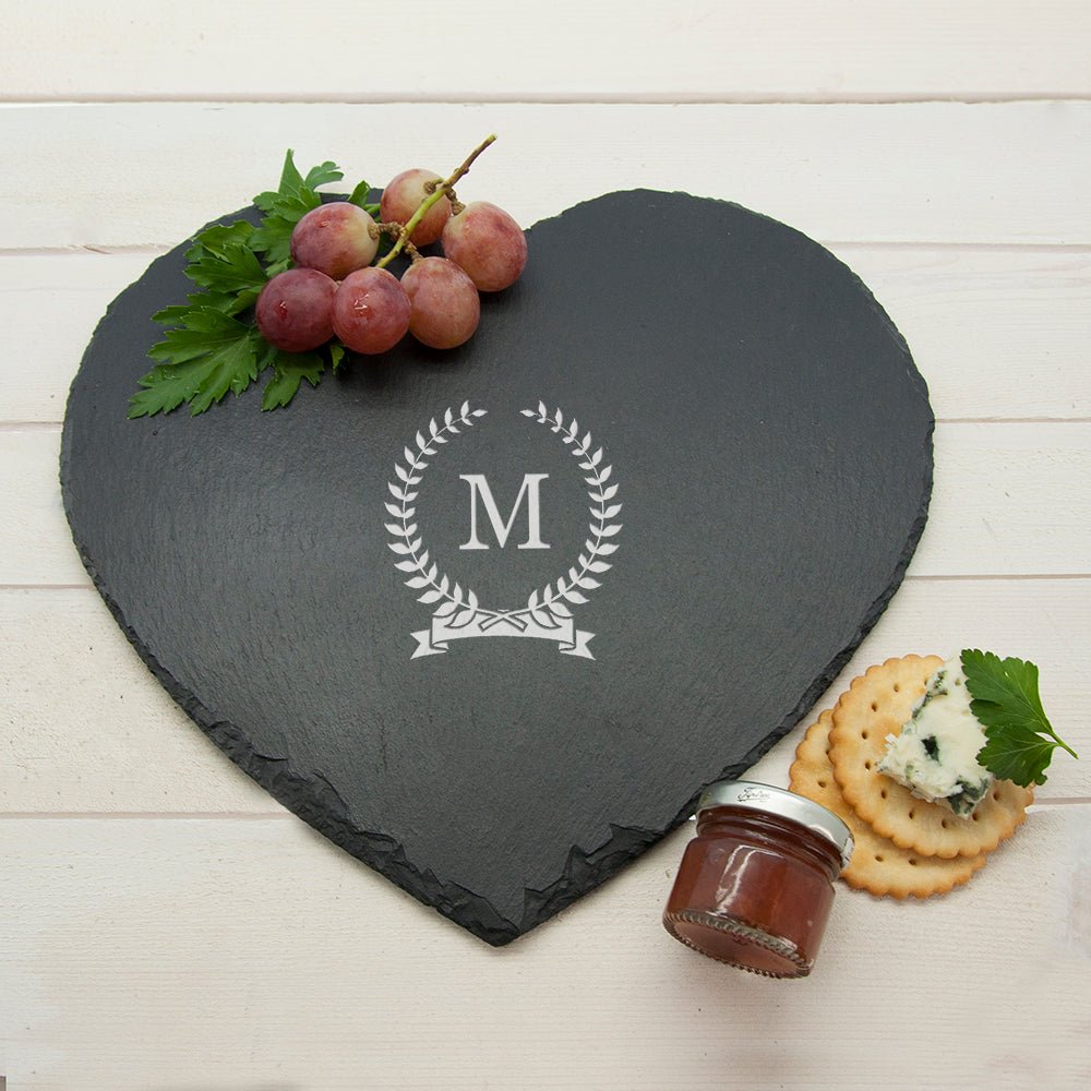 Monogrammed heart-shaped slate cheese board with wreath design, personalized with one initial, 28.5x29.5cm.