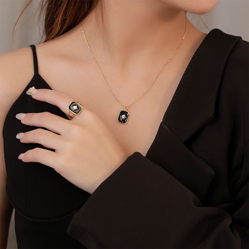 Minimalist Octagram Necklace in sterling silver, 40+6cm chain, 2.65g, available in black or white.