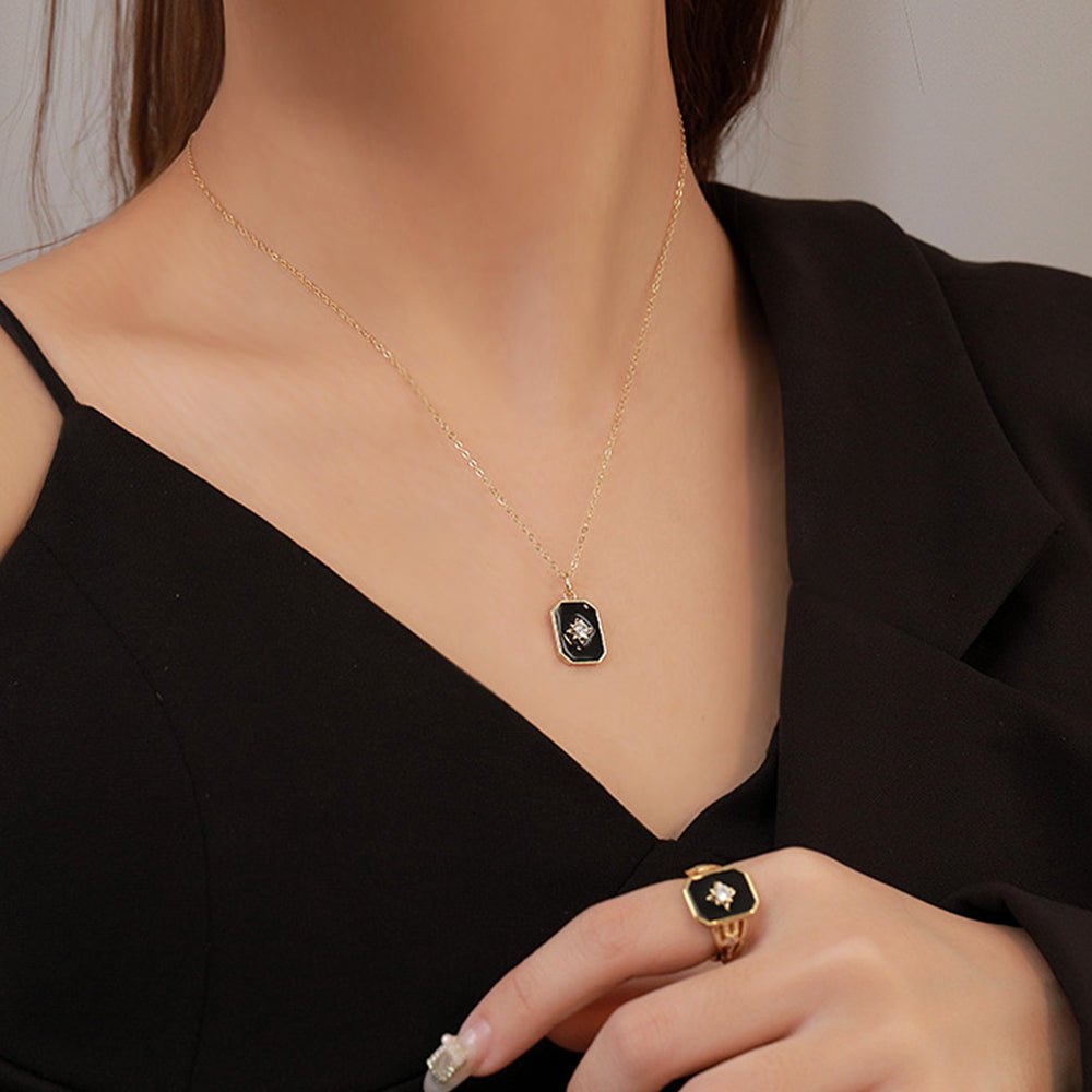 Minimalist Octagram Necklace in sterling silver, 40+6cm chain, 2.65g, available in black or white.