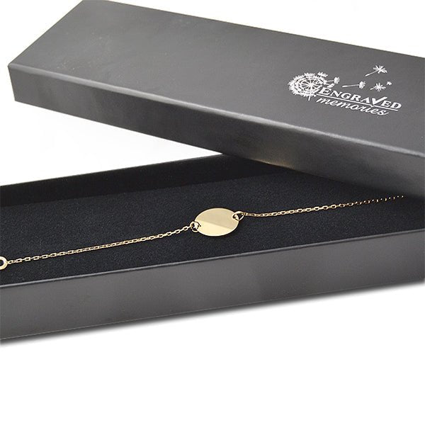 Elegant 18Kt Gold Plated bracelet with engravable disc for initials, perfect for Mother's Day or special occasions.