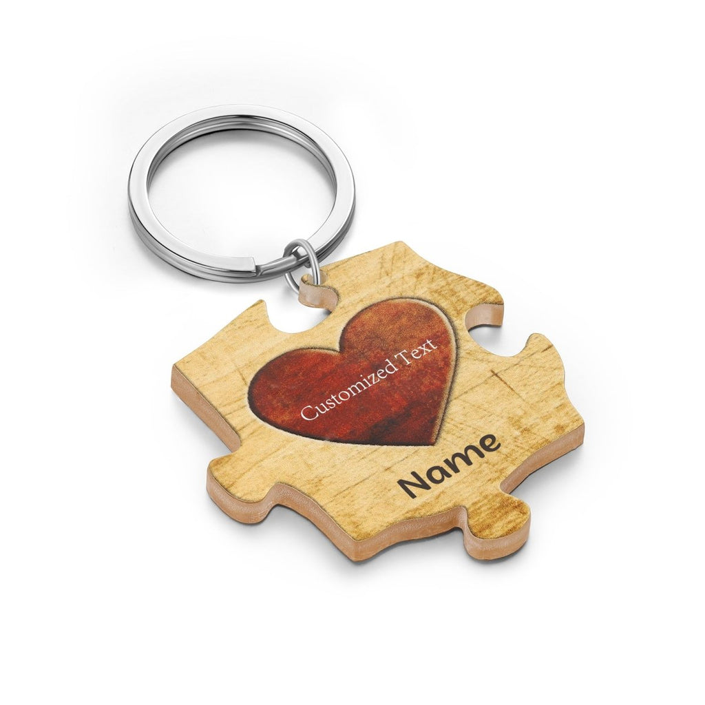 Personalised acrylic puzzle keychain (64×47mm) with custom names—up to 7 engraved pieces for a unique gift.