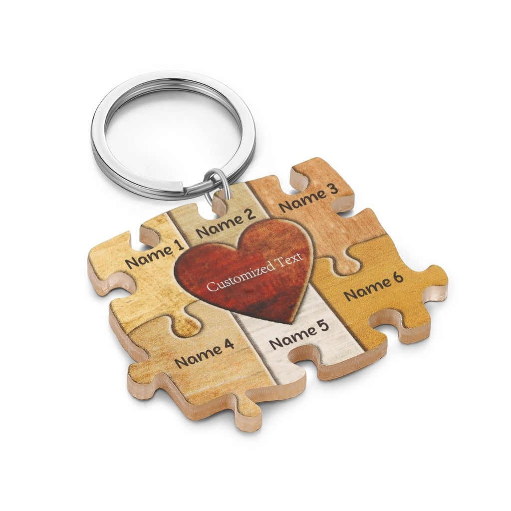 Personalised acrylic puzzle keychain (64×47mm) with custom names—up to 7 engraved pieces for a unique gift.