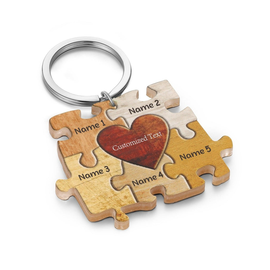 Personalised acrylic puzzle keychain (64×47mm) with custom names—up to 7 engraved pieces for a unique gift.