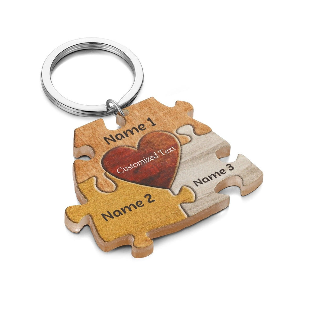 Personalised acrylic puzzle keychain (64×47mm) with custom names—up to 7 engraved pieces for a unique gift.
