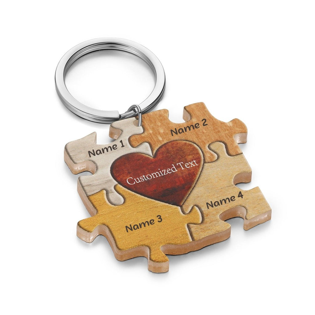 Personalised acrylic puzzle keychain (64×47mm) with custom names—up to 7 engraved pieces for a unique gift.