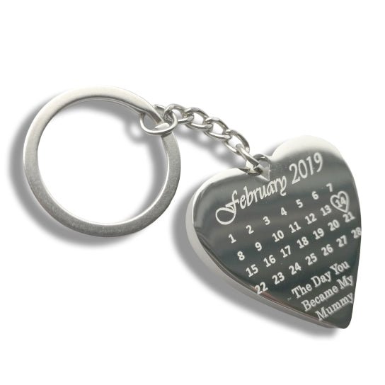 Personalized heart-shaped silver keyring with engraved special date, message, and photo, mirror polished stainless steel, 4cm x 2.5cm