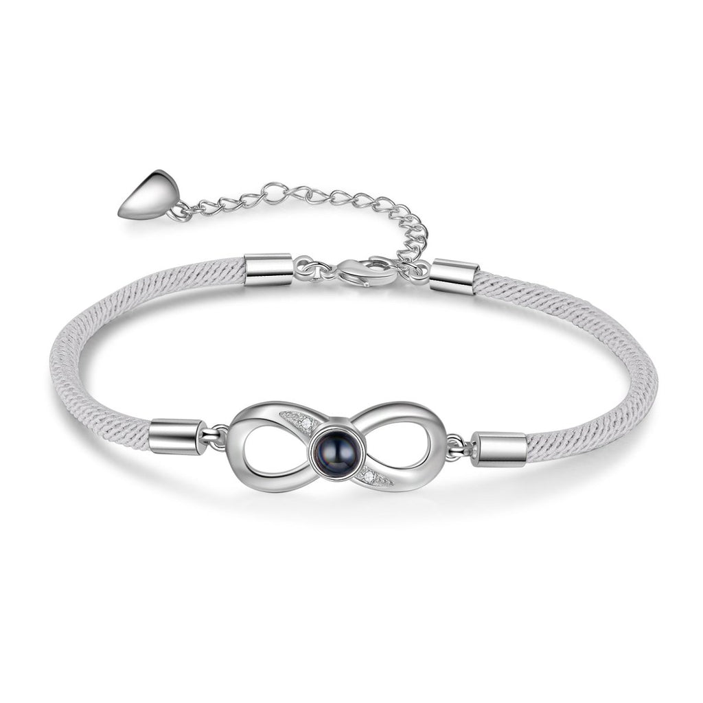 Personalised infinity charm bracelet (20+5cm) with photo projection— a unique way to showcase your love.